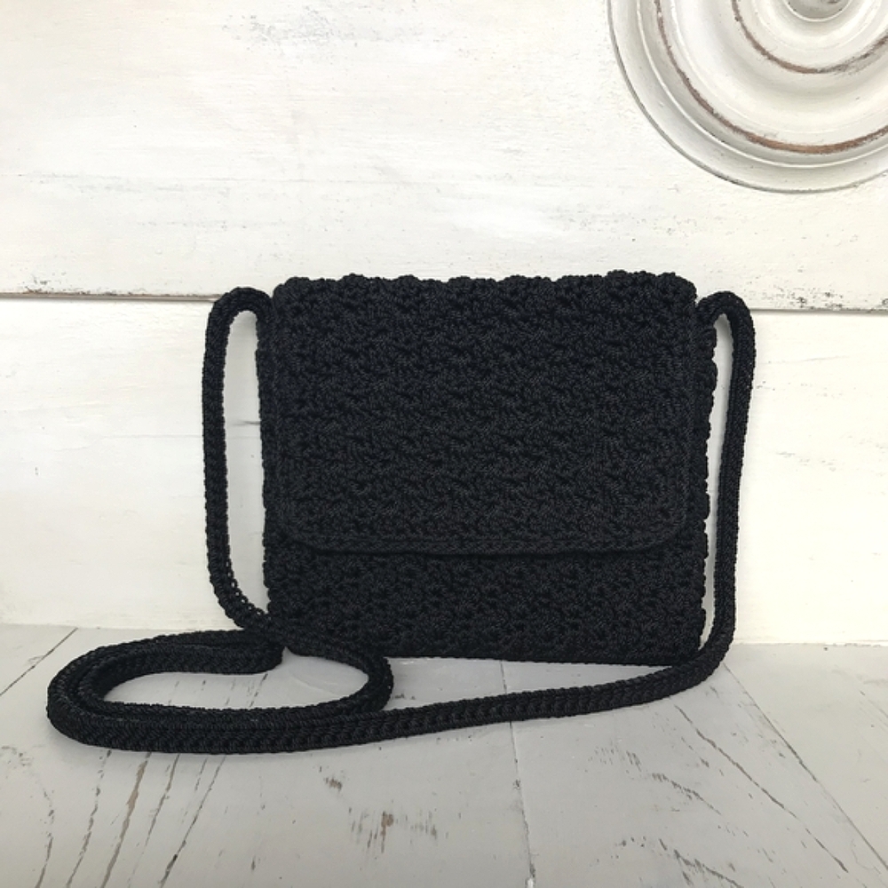 The Sak Crochet Mini Crossbody Bag with Zipper in Black